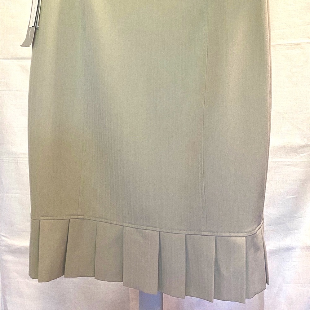 Tan skirt with hemline pleats